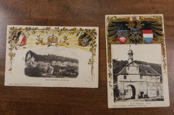 Bad SODEN zwei gedruckte Gold-Prägedruck Karten mit farbigen Wappen + Stadtansichten von Telgmann/Es